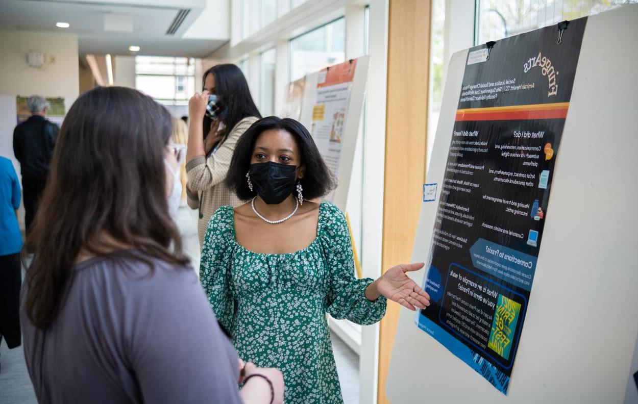 Students attending the Praxis Poster Session 2022
