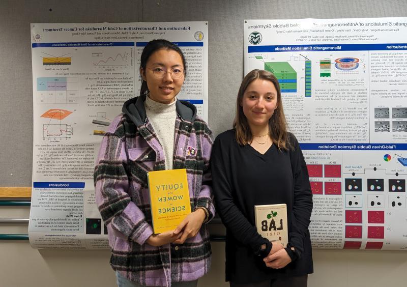 Thea Liao '25 and Eva K Carmona-Rogina '25 with their physics poster at conference