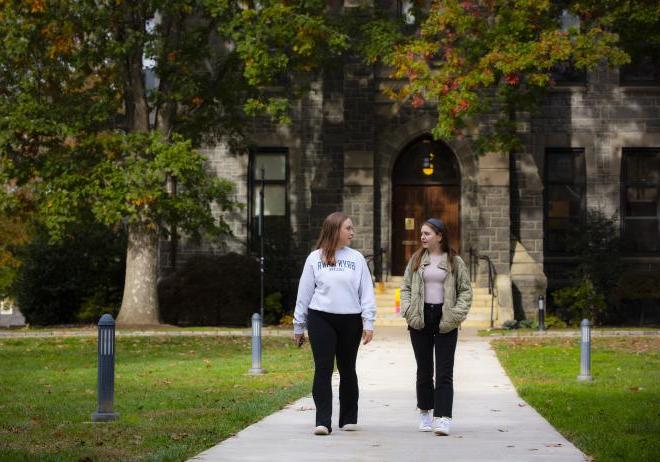 students walking in front of taylor hall